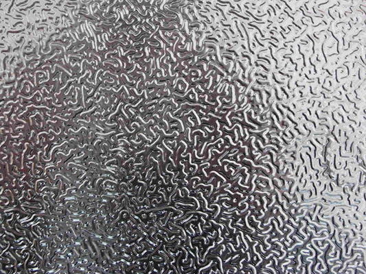 Oranje schilpatroon / Stucco aluminium plaat / spoel